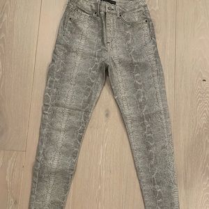 Snakeskin skinny jeans